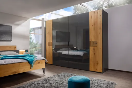 Drehtürenschrank - B. ca. 301 cm, Außentüren Wildeiche massiv mit Hirnholzeinlage massiv, Farbglas Graphit