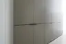 Drehtürenschrank Matera - BHT ca. 301x235x60 cm, Lack Matt, Muschelgrau, Griffe Coffee