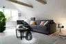 Ecksofa Nuoro - Longchair links mit 2-Sitzer inkl. Schlaffunktion und Bettkasten, Stoff, Grau